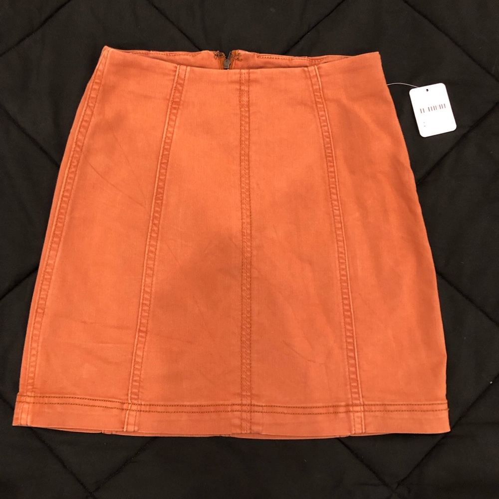 Free people NWT bronze mini skirt. Size 2 modern femme